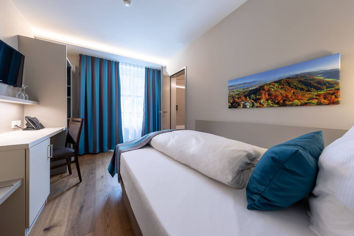Premium bedding, in-room safe, desk, soundproofing