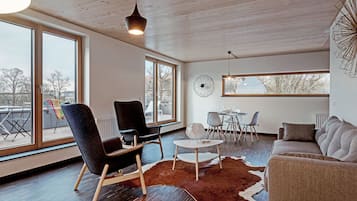 Design Penthouse, 2 Bedrooms, Terrace, Executive Level | Living area | 45-inch flat-screen TV with cable channels, TV, Netflix