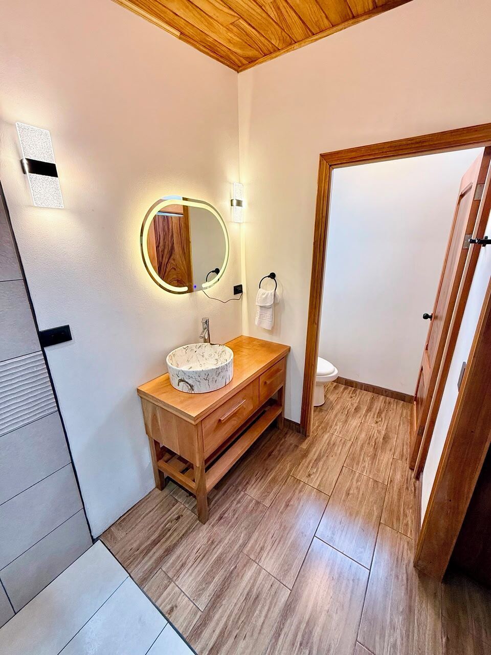 Studio | Bathroom | Shower, rainfall showerhead, designer toiletries, hair dryer