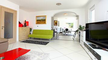 Apartment, 3 Bedrooms, Sea View (Penthouse) | Living area | Flat-screen TV