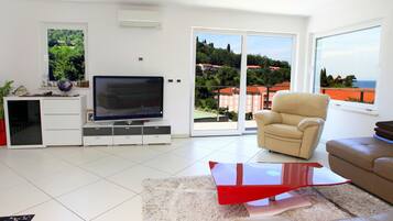 Apartment, 3 Bedrooms, Sea View (Penthouse) | Living area | Flat-screen TV