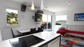 Apartment, 2 Bedrooms, Sea View | Living area | Flat-screen TV - Heart of Strunjan Apartments AL (Piran)