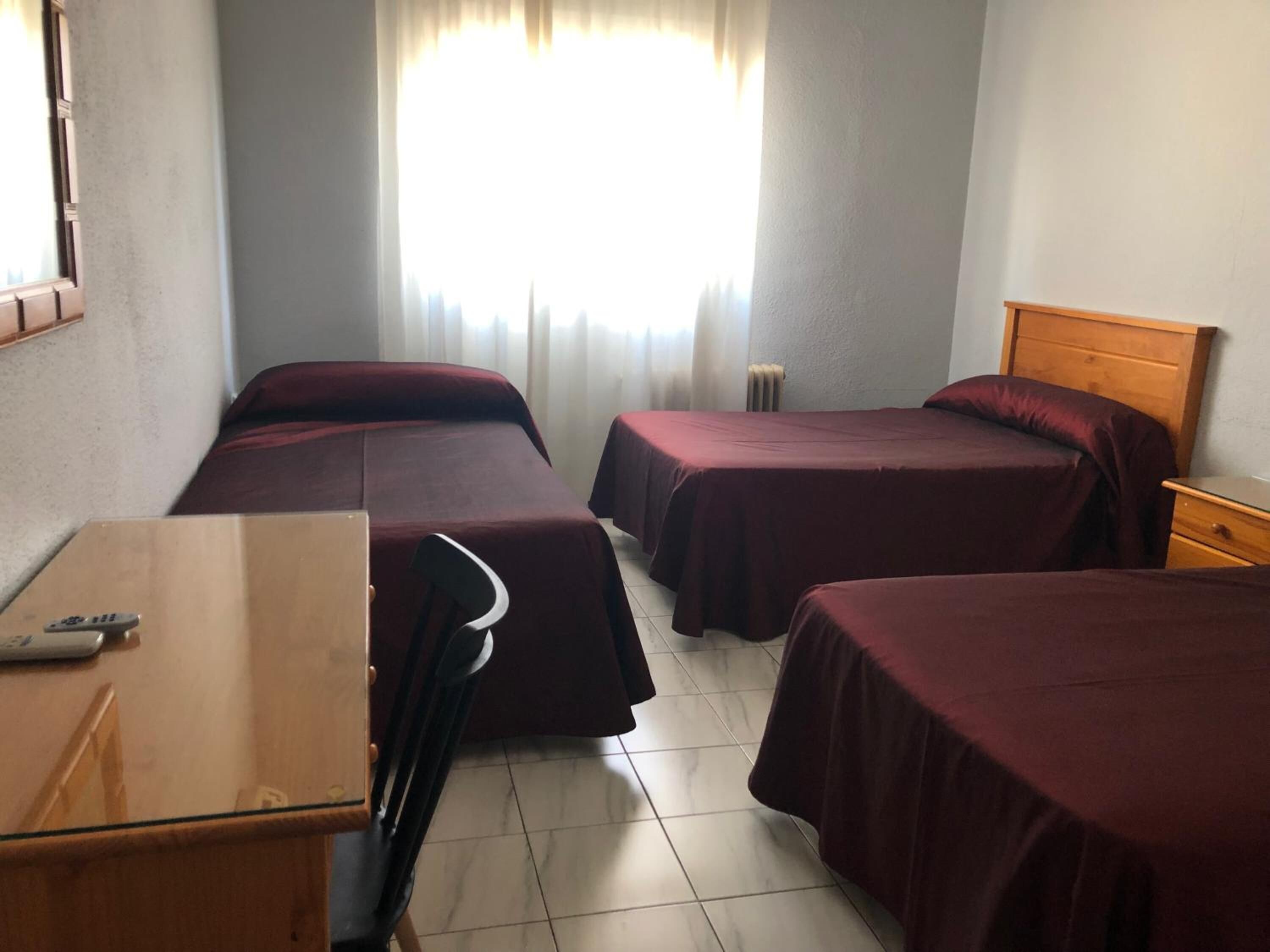 desk, blackout curtains, free wifi, bed sheets