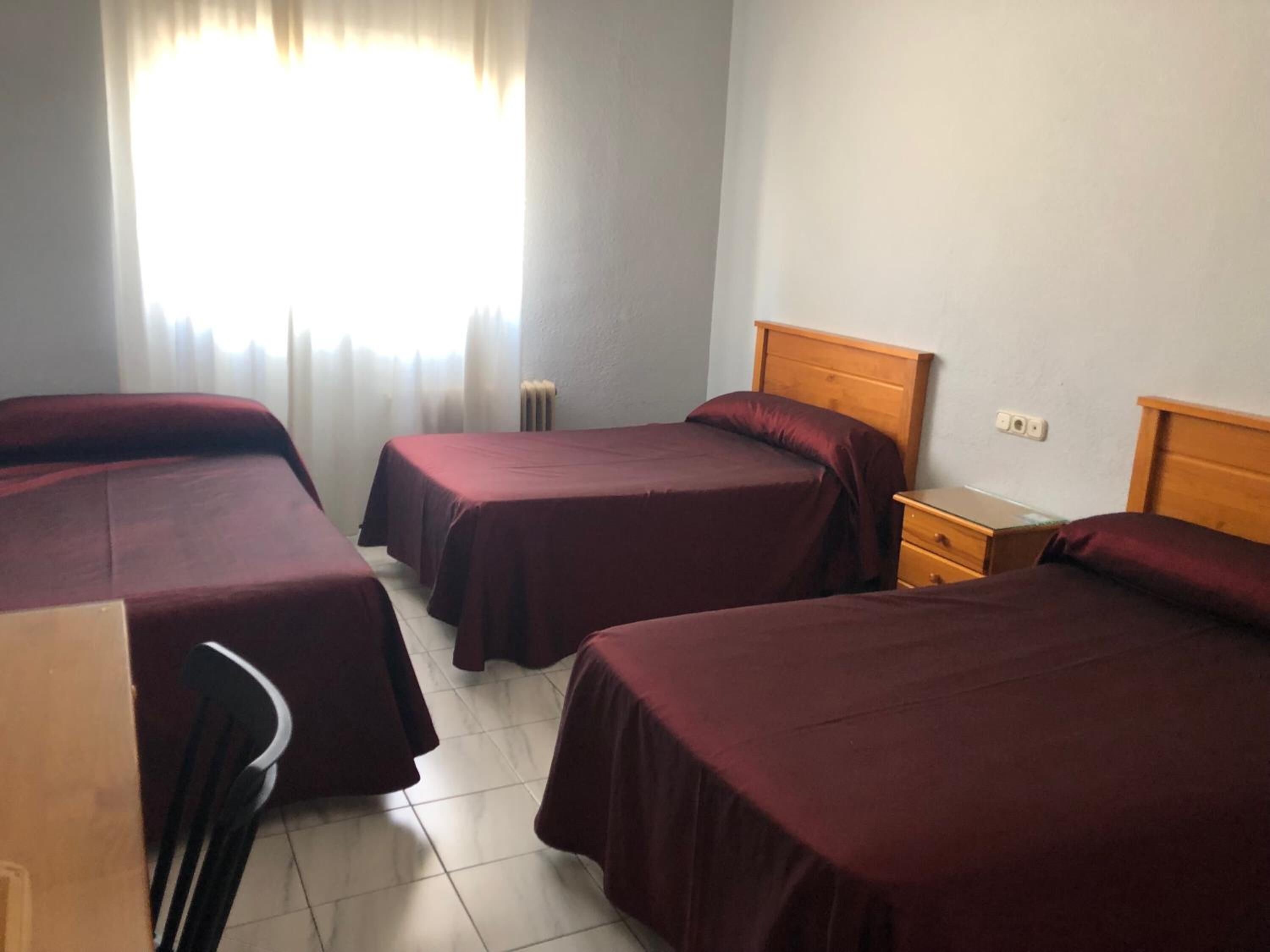 desk, blackout curtains, free wifi, bed sheets