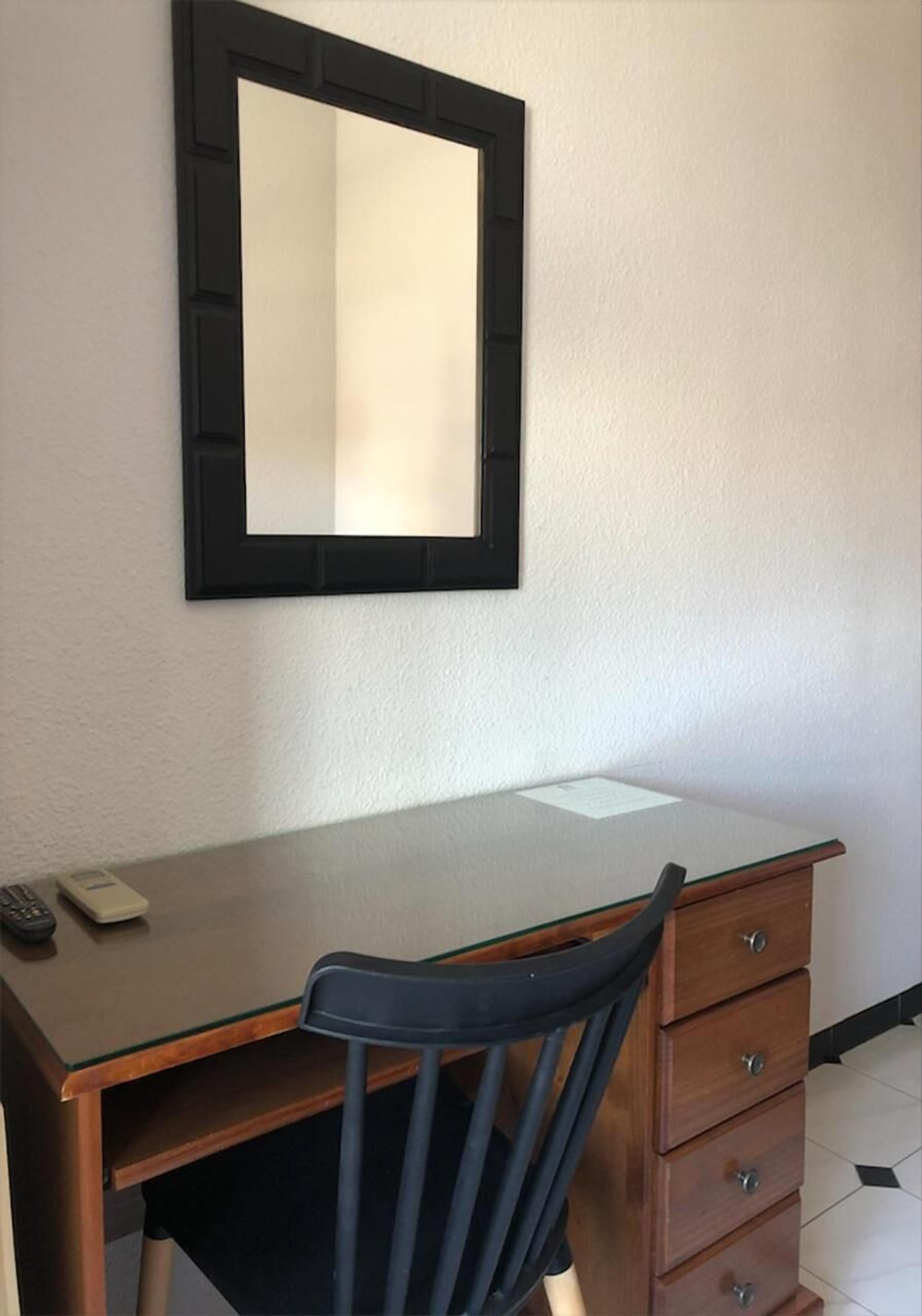 desk, blackout curtains, free wifi, bed sheets