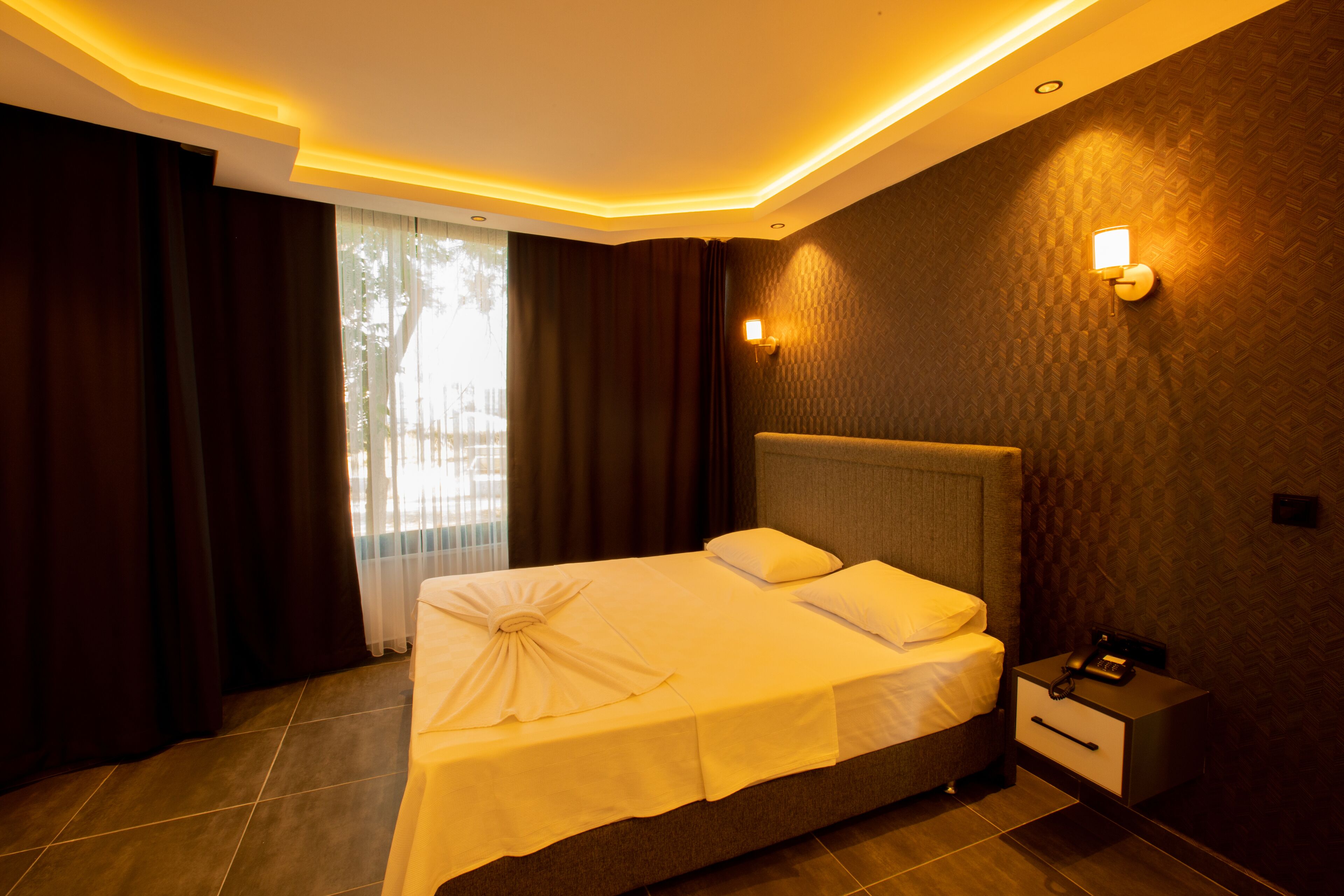 Familienzimmer | Minibar, Schreibtisch, laptopgeeigneter Arbeitsplatz, kostenloses WLAN