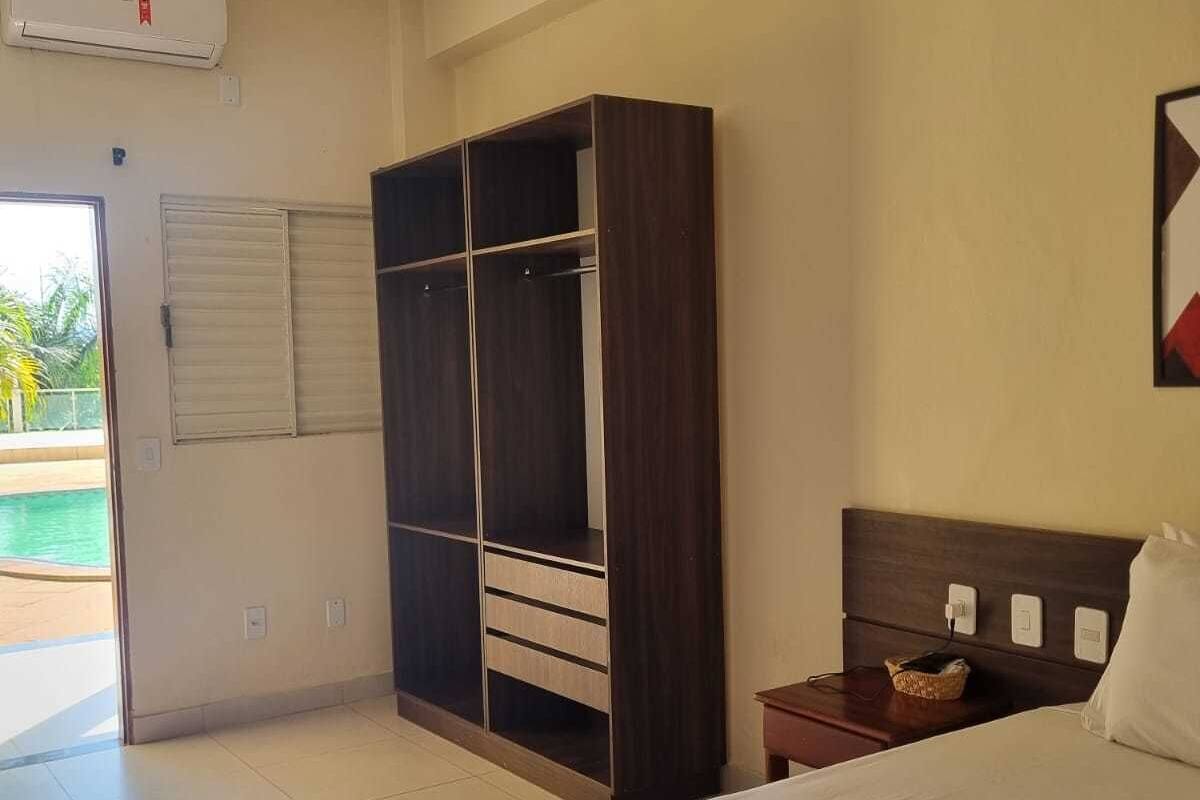 Apartment, Pool View | Minibar, WiFi (free), individually furnished, bed sheets