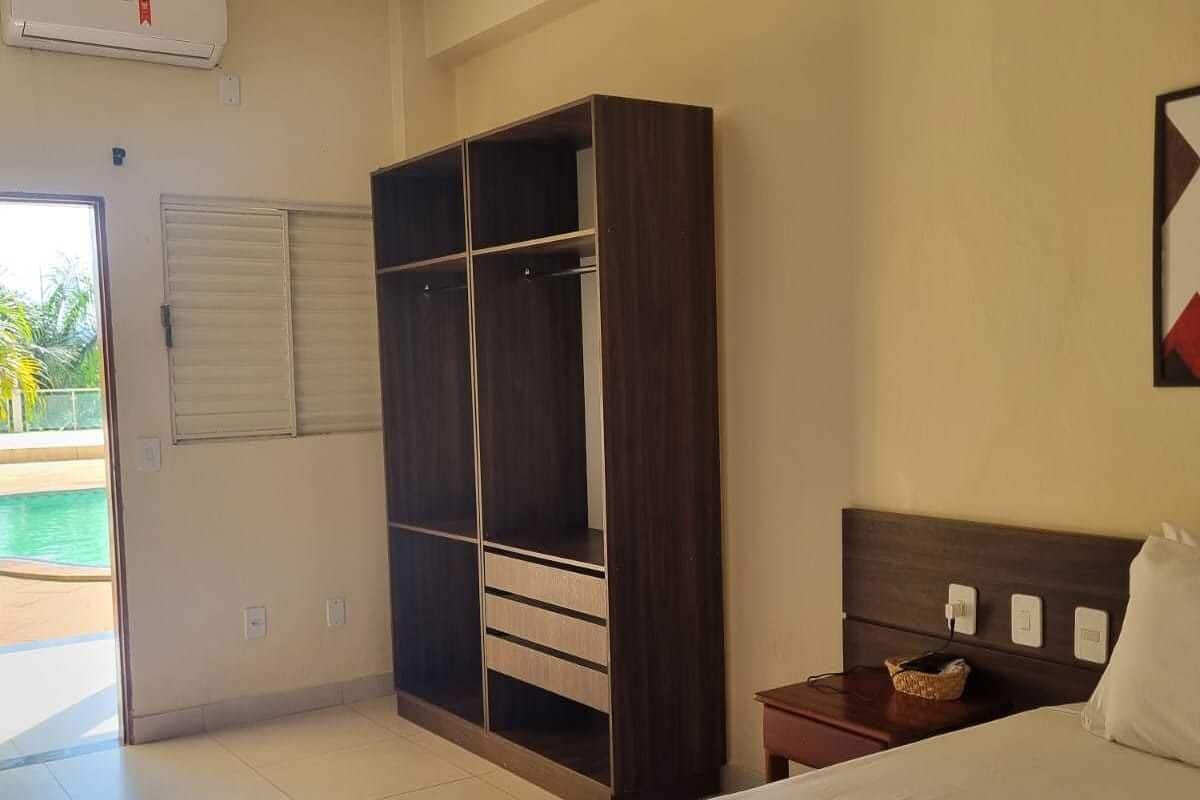Apartment, Pool View | Minibar, WiFi (free), individually furnished, bed sheets