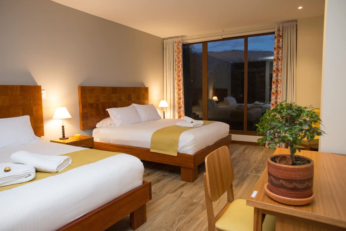 deluxe double room, 2 queen beds | 1 bedroom, in-room safe, desk, iron/ironing board