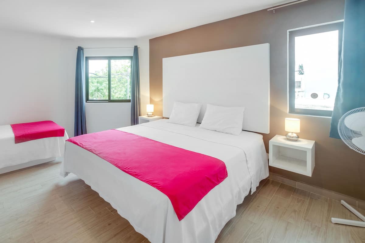 Deluxe Apartment, Multiple Beds, Balcony, Corner | In-room safe, blackout curtains, iron/ironing board, free WiFi
