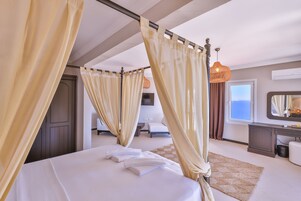 Luxury Suite, Balcony, Sea View | Premium bedding, minibar, in-room safe, laptop workspace
