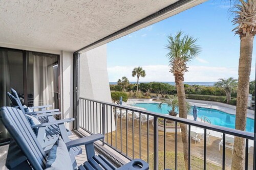 Stunning pool and ocean views await you in this beautiful, convenient condo.