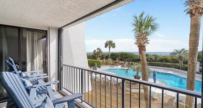 Stunning pool and ocean views await you in this beautiful, convenient condo.