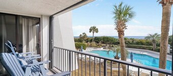 Stunning pool and ocean views await you in this beautiful, convenient condo.