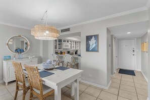 Dining - Stunning pool and ocean views await you in this beautiful, convenient condo. (Wrightsville Beach)