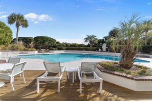 Outdoor pool - Stunning pool and ocean views await you in this beautiful, convenient condo. (Wrightsville Beach)