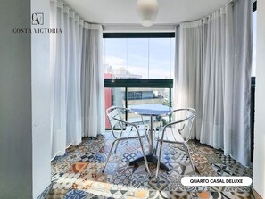 Deluxe Double Room, 1 Queen Bed | Living area | 32-inch LCD TV with cable channels -  Costa Victoria Residence (Vitoria)