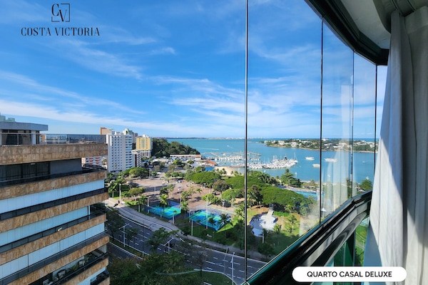 Deluxe Double Room, 1 Queen Bed | Living area | 32-inch LCD TV with cable channels