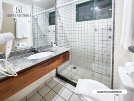 Economic Room | Bathroom | Shower, free toiletries, hair dryer, towels