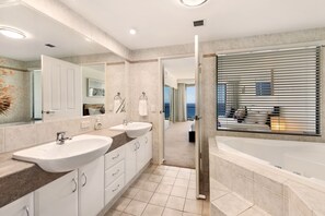 Bathtub, hair dryer, towels