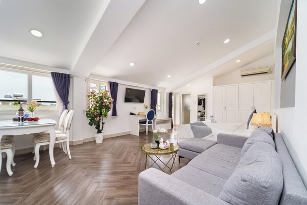 Departamento familiar | 1 habitación, minibar, caja de seguridad en la habitación y escritorio 