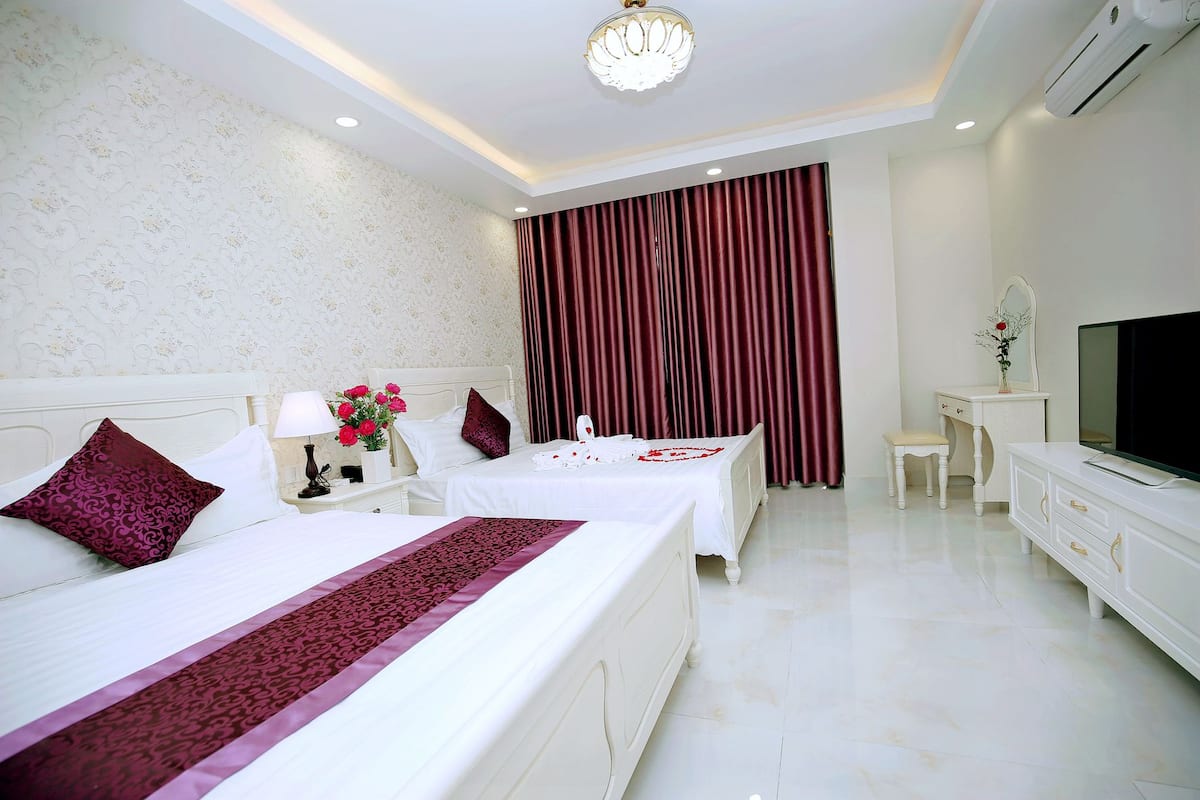 Phòng 2 giường đơn Deluxe, ban công | 1 phòng ngủ, minibar, màn/rèm cản sáng