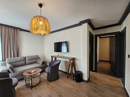 Loft familiar | Ropa de cama de alta calidad, minibar, ropa de cama