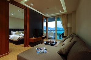 One Bedroom Condo | Living area | Flat-screen TV - Privilege Panoramic Sea View (Patong)