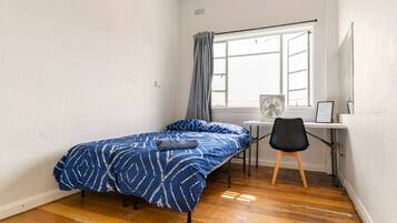 Desk, blackout curtains, free WiFi, bed sheets