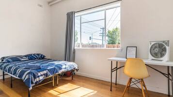 Desk, blackout curtains, free WiFi, bed sheets