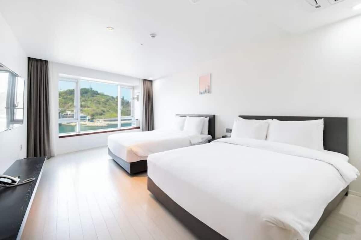 Ropa de cama de alta calidad y cortinas blackout