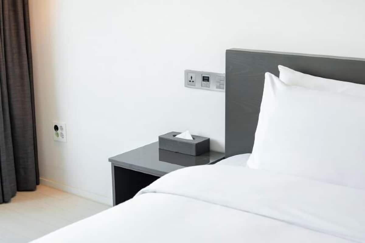 Ropa de cama de alta calidad y cortinas blackout