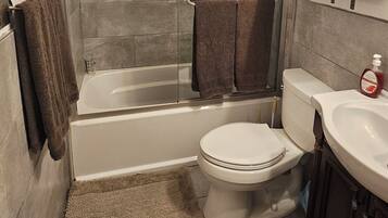 Hair dryer, towels, soap, shampoo