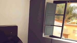 Apartamento, 3 habitaciones | 3 dormitorios, cortinas opacas, wifi gratis y ropa de cama