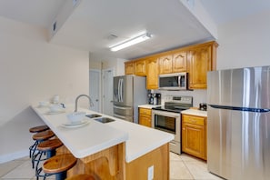 Fridge, microwave, stovetop, dishwasher - Orange Beach Family Duplex w/ Deck < 1 Mi to Shore (Orange Beach)