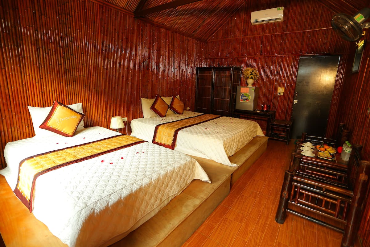 Chambre Triple (Bungalow) | Minibar, coffres-forts dans les chambres, bureau, chambres insonorisées