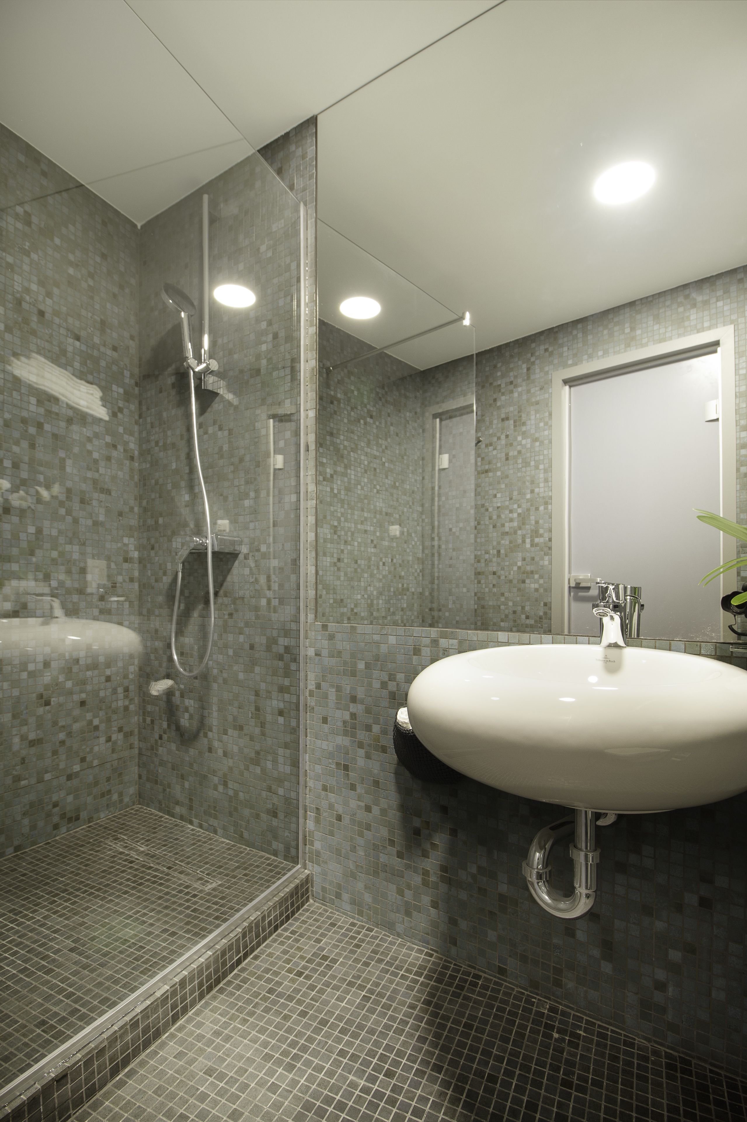 superior twin room | bathroom | shower, free toiletries, hair dryer, bathrobes
