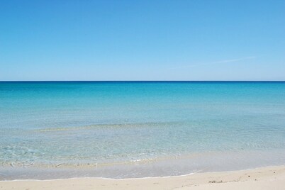 Villa at 20 m. from the sea on the beautiful and unspoiled beach of Carratois