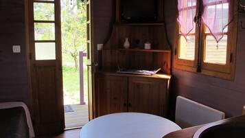 Cabin (Mauve) | Living area | Flat-screen TV