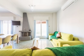 Grand Apartment (Near Metro #1) | Living area | Flat-screen TV - Space Paradise Apartments (Athens)