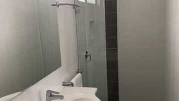 Blackout curtains, iron/ironing board, free WiFi, bed sheets