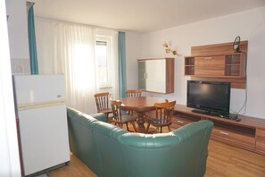 Apartment, Terrace | Living area | Flat-screen TV