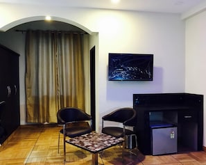 32-inch flat-screen TV with cable channels, TV - The Park Residency (Greater Noida)