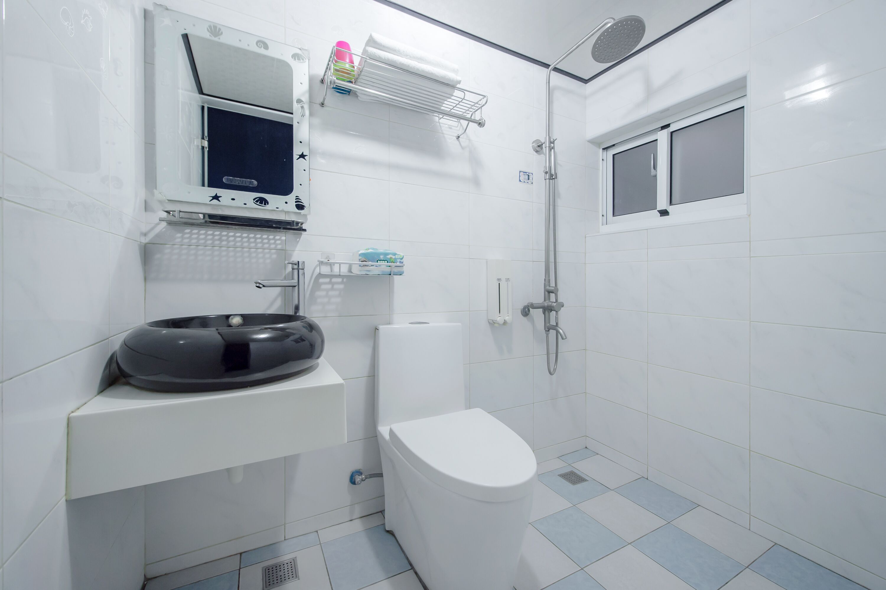 Four-person room in the building | Bathroom | Shower, rainfall showerhead, hair dryer, slippers