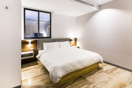 Ropa de cama de alta calidad y minibar