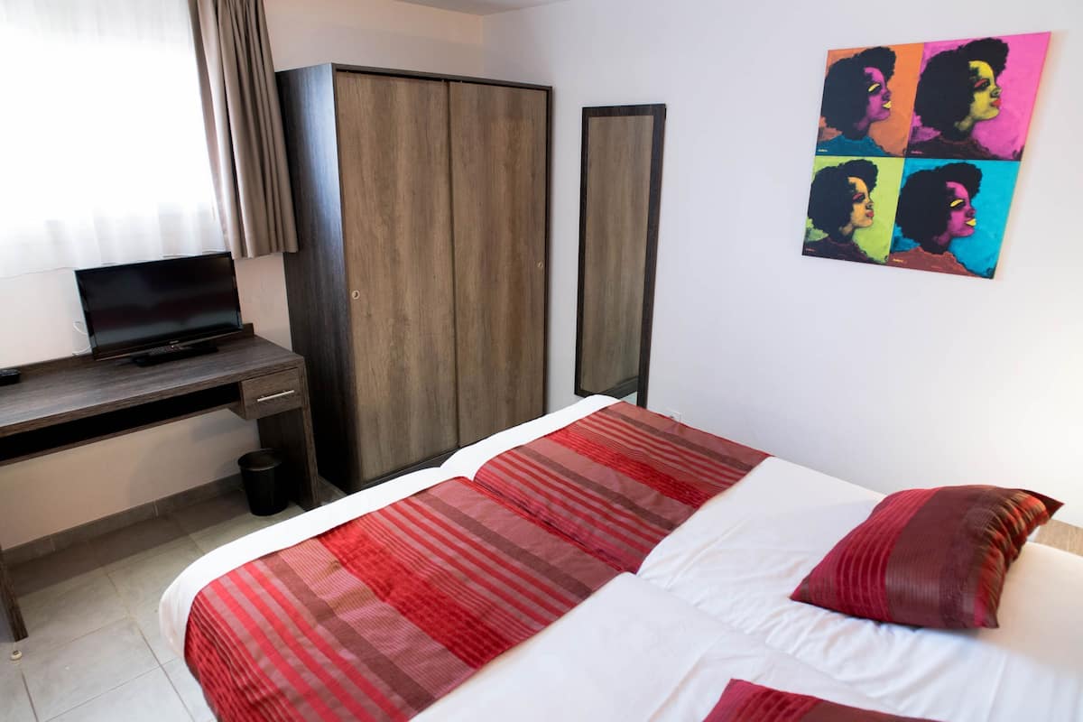 Standard Apartment | Individually decorated, individually furnished, desk, blackout curtains