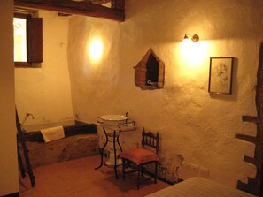 Family Apartment, 1 Bedroom, Kitchenette, Garden View | Deep soaking bathtub