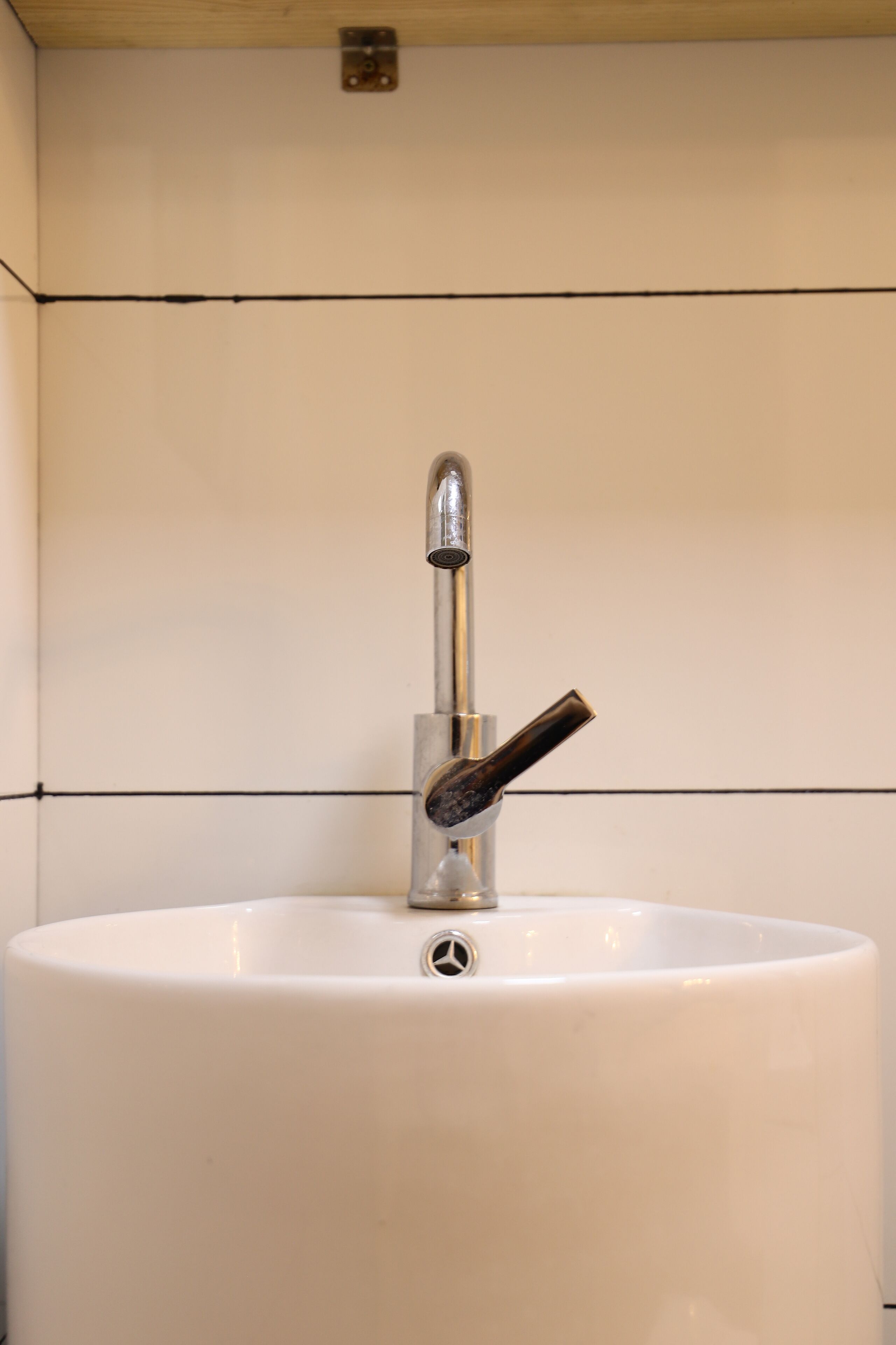 A bathroom sink with a modern faucet and a single-handle design.
