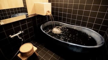 Deep-soaking bathtub, free toiletries, hair dryer, slippers