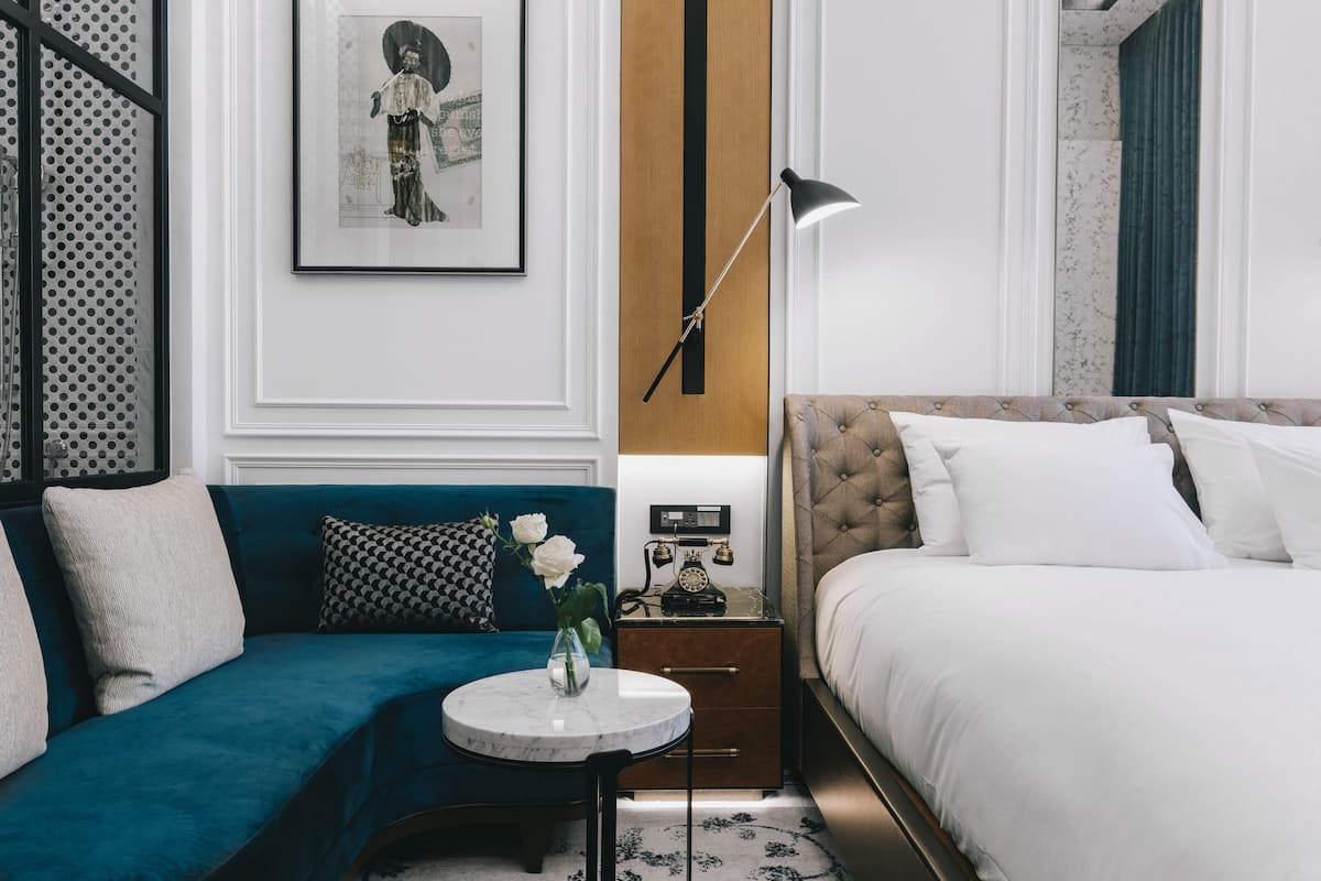 deluxe room, multiple beds, city view | minibar, in-room safe, desk, blackout curtains